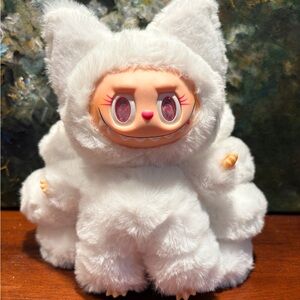 White Furry Fox with nine tails